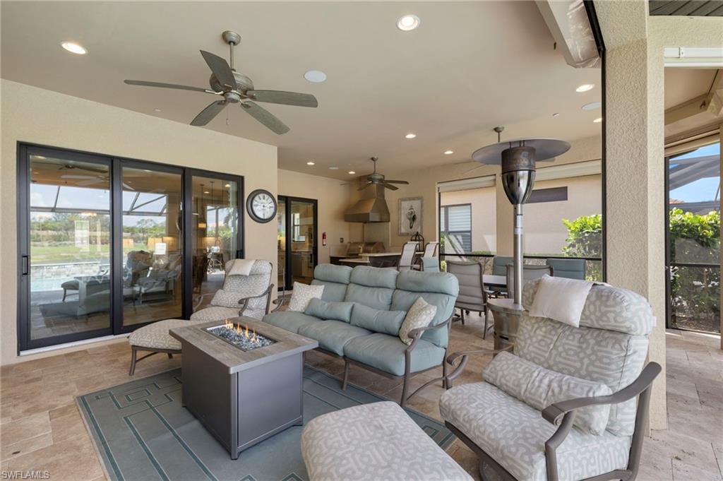 10234 Coconut Road Estero, FL 34135 - Photo 29 of 36 a living room with furniture and a large window