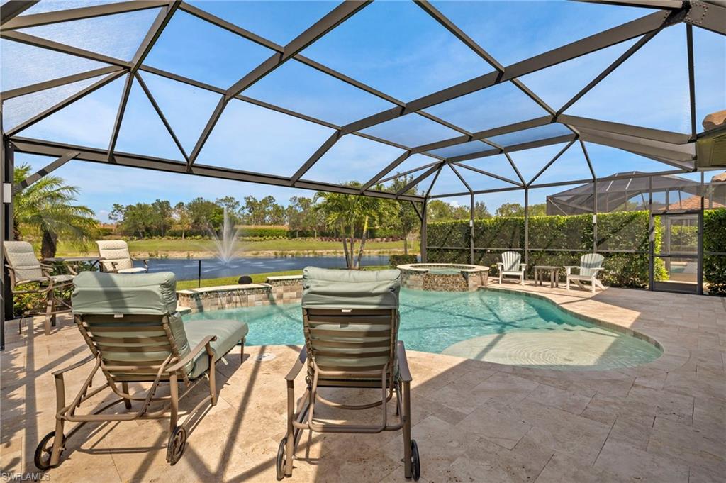 10234 Coconut Road Estero, FL 34135 - Photo 33 of 36 a view of a backyard with sitting area