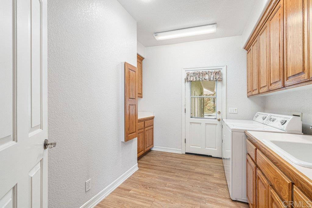 4327 Hollyhill Road Vista, CA 92084 - Photo 19 of 40 Large Laundry Room