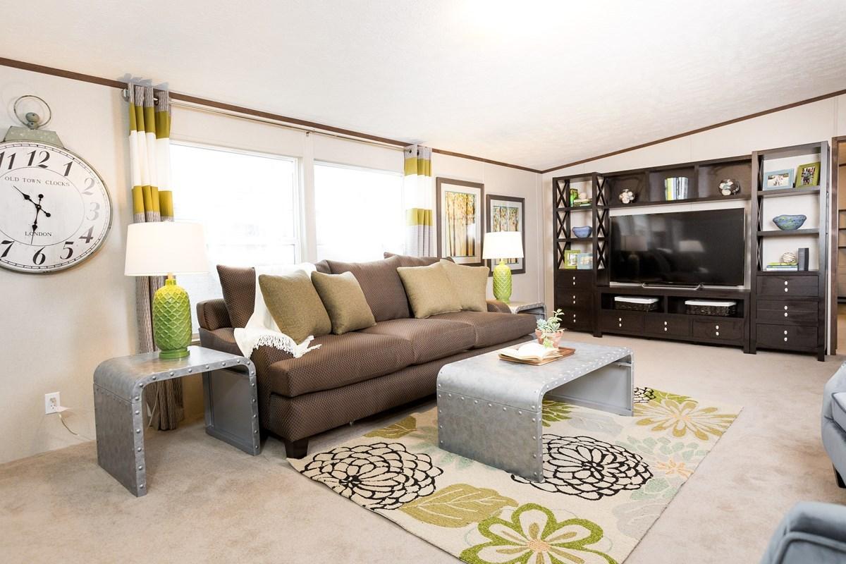 1514 Trotter Way Baker, FL 32531 - Photo 3 of 8 a living room with furniture and a flat screen tv