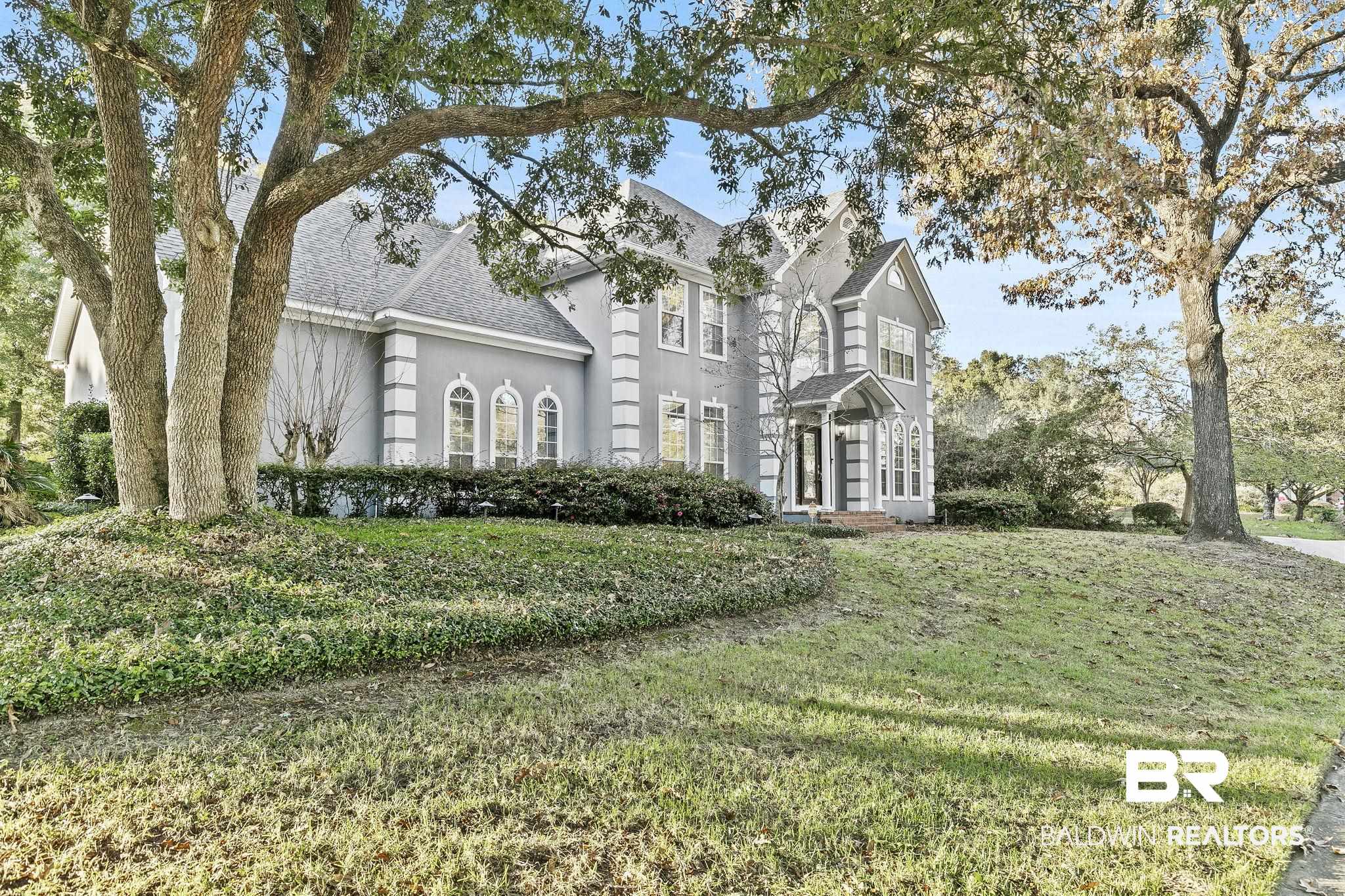 2100 Stonebrook Drive West Mobile, AL 36695 - Photo 6 of 60 View of front of house with a front lawn
