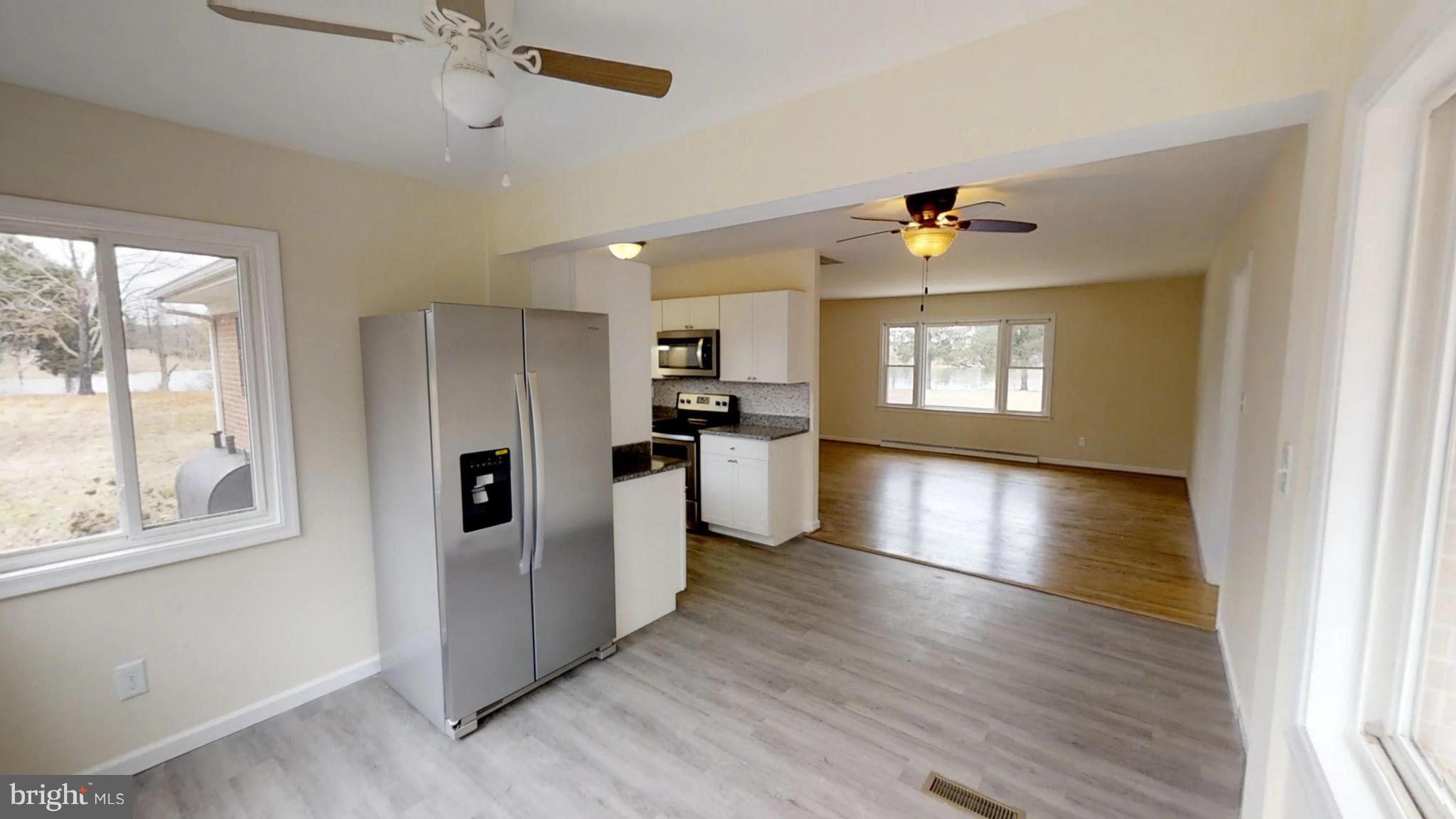 21410 Springfield Road Bushwood, MD 20618 - Photo 11 of 47 View from the back door into the kitchen