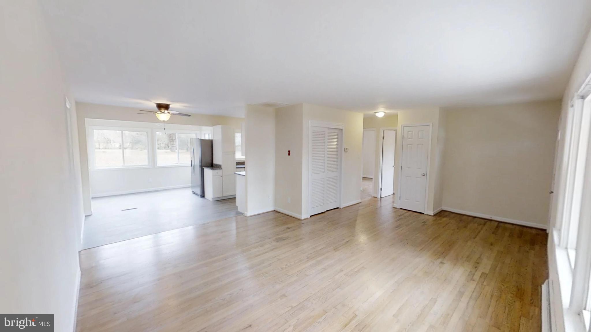 21410 Springfield Road Bushwood, MD 20618 - Photo 12 of 47 Living room/ Kitchen/Dining area