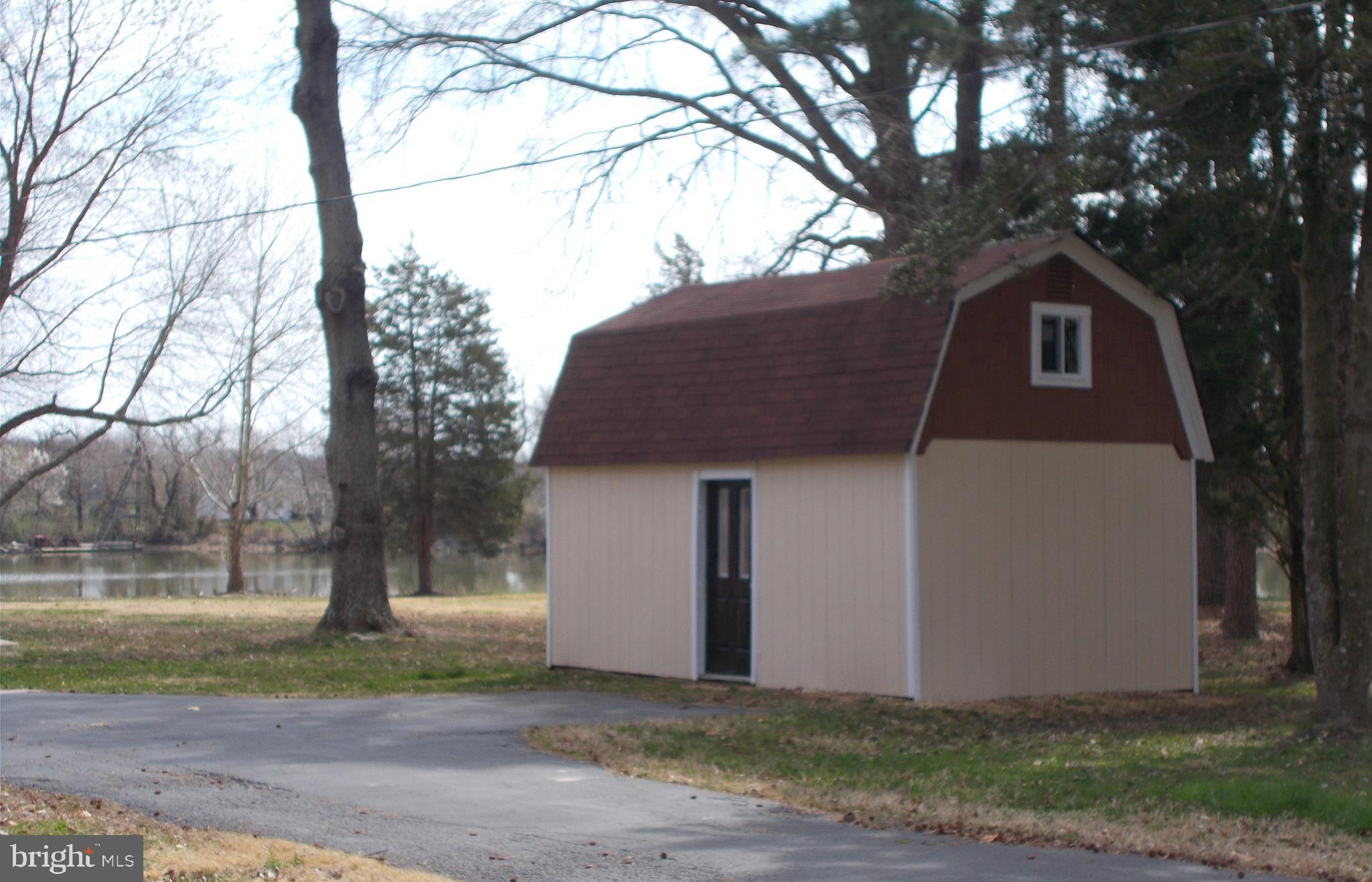 21410 Springfield Road Bushwood, MD 20618 - Photo 33 of 47 Shed/Workshop with new windows