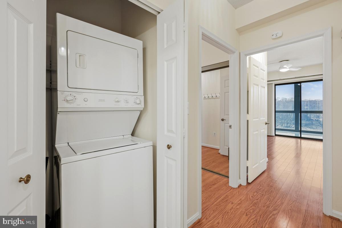 3100 North Leisure World Boulevard, Unit 603 Silver Spring, MD 20906 - Photo 25 of 49 a view of a hallway with wooden floor and entryway