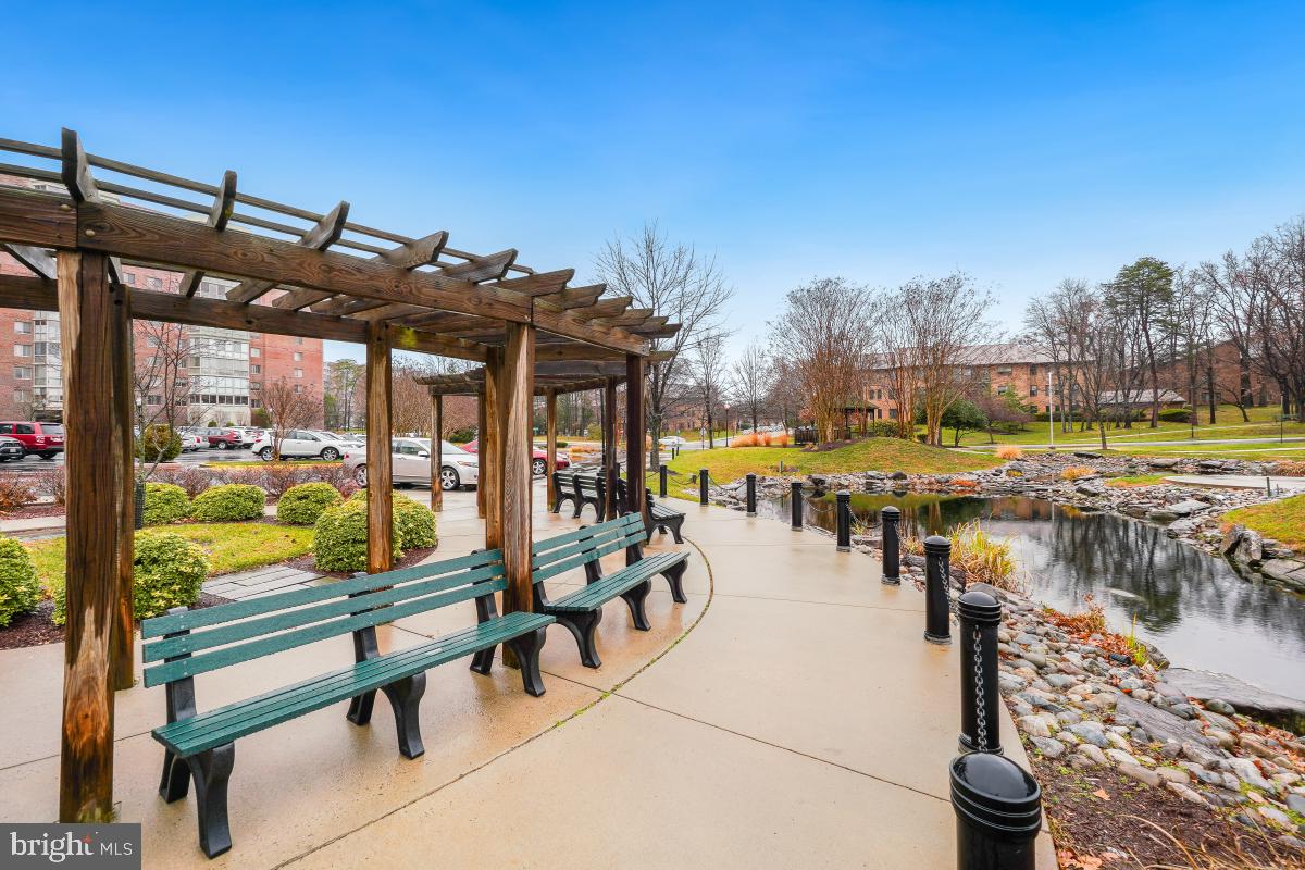 3100 North Leisure World Boulevard, Unit 603 Silver Spring, MD 20906 - Photo 32 of 49 a view of swimming pool with outdoor seating