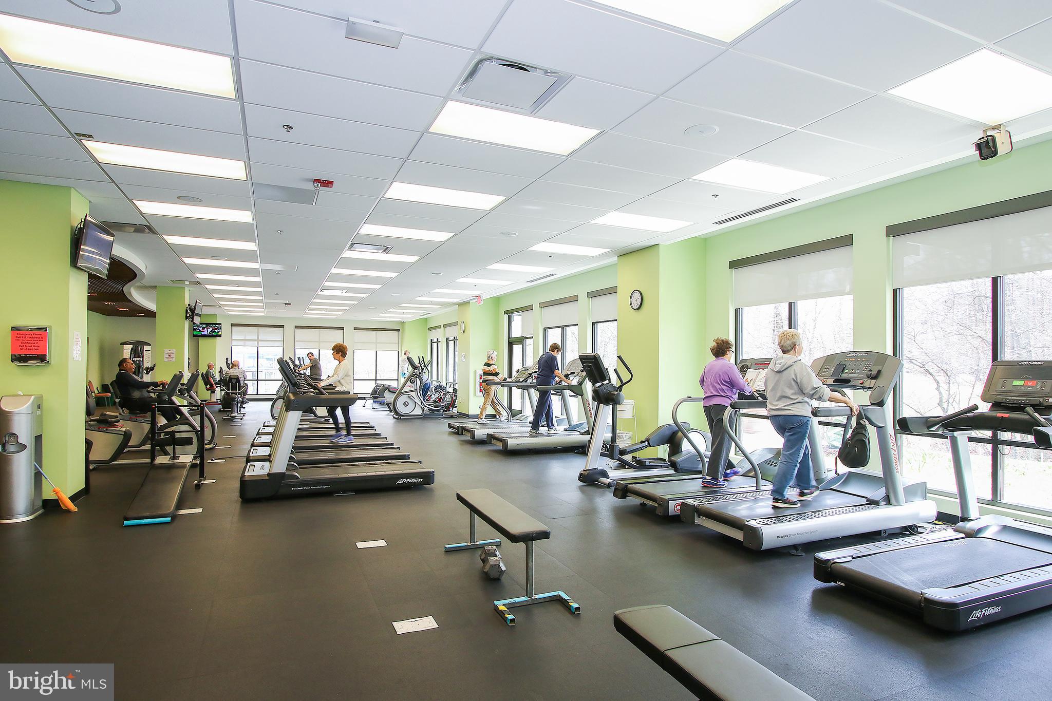 3100 North Leisure World Boulevard, Unit 603 Silver Spring, MD 20906 - Photo 37 of 49 a view of a room with gym equipment