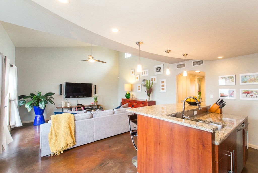 41 Waller Street, Unit 308 Austin, TX 78702 - Photo 11 of 34 a living room with furniture and a flat screen tv