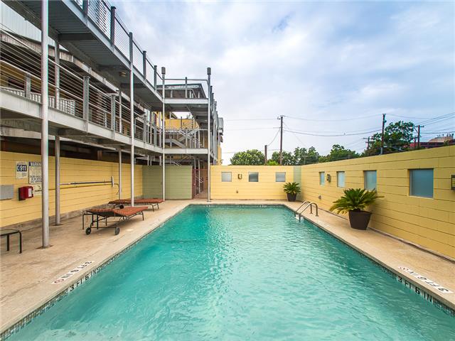 41 Waller Street, Unit 308 Austin, TX 78702 - Photo 2 of 34 a view of a swimming pool with chairs