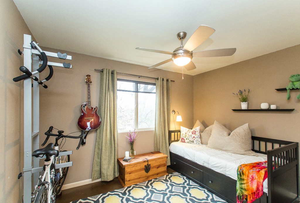 41 Waller Street, Unit 308 Austin, TX 78702 - Photo 24 of 34 a bedroom with furniture and a window