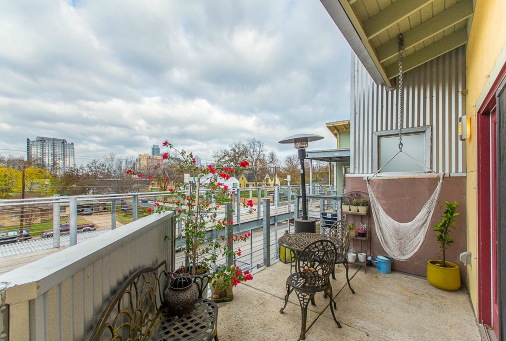 41 Waller Street, Unit 308 Austin, TX 78702 - Photo 30 of 34 a view of a chairs and table in the balcony