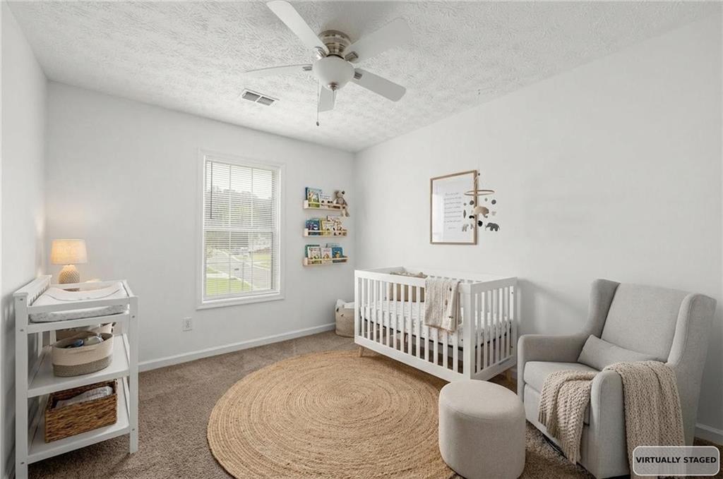 1093 Athena Court Acworth, GA 30101 - Photo 16 of 27 a living room with furniture and a window