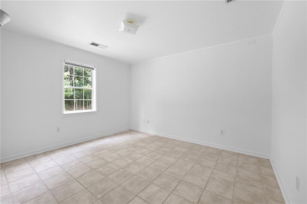 1093 Athena Court Acworth, GA 30101 - Photo 22 of 27 an empty room with windows