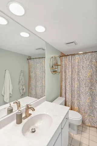 a view of a sink and cabinets