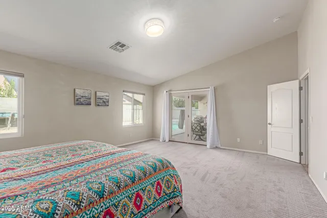 a kitchen with granite countertop a sink stove and cabinets