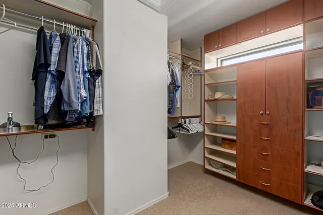 a bathroom with a sink double vanity and a mirror