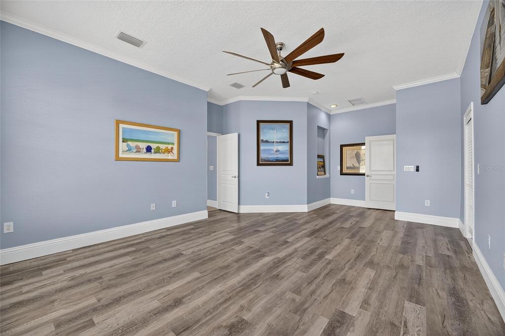 5720 Tortoise Place Apollo Beach, FL 33572 - Photo 31 of 83 a view of a big room with wooden floor and windows