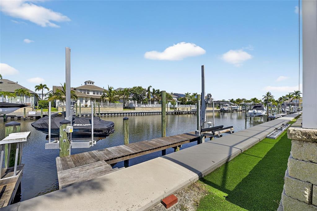 5720 Tortoise Place Apollo Beach, FL 33572 - Photo 55 of 83 a view of a lake with couches and chairs