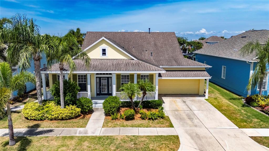 5720 Tortoise Place Apollo Beach, FL 33572 - Photo 57 of 83 a front view of house with yard outdoor seating and entertaining space