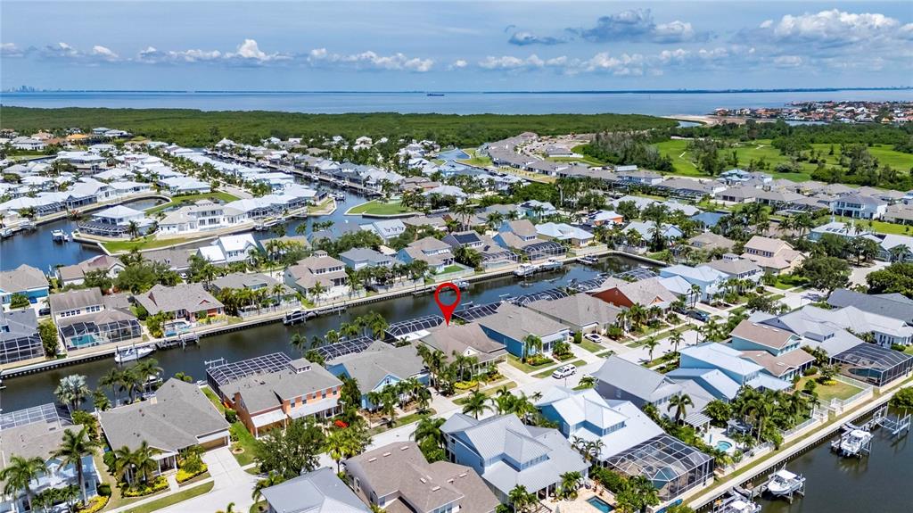 5720 Tortoise Place Apollo Beach, FL 33572 - Photo 68 of 83 an aerial view of a city with a lake