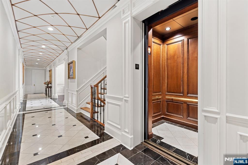 146 East Allendale Road Saddle River, NJ 07458 - Photo 11 of 28 a view of an entryway with wooden floor