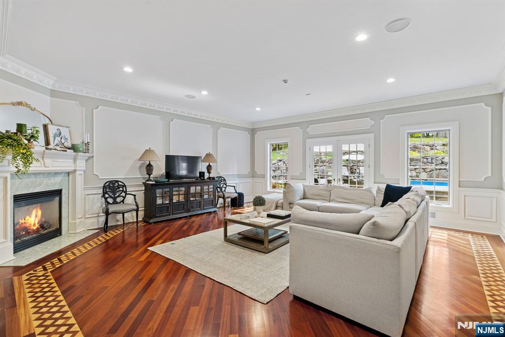 146 East Allendale Road Saddle River, NJ 07458 - Photo 8 of 28 a living room with furniture and a wooden floor