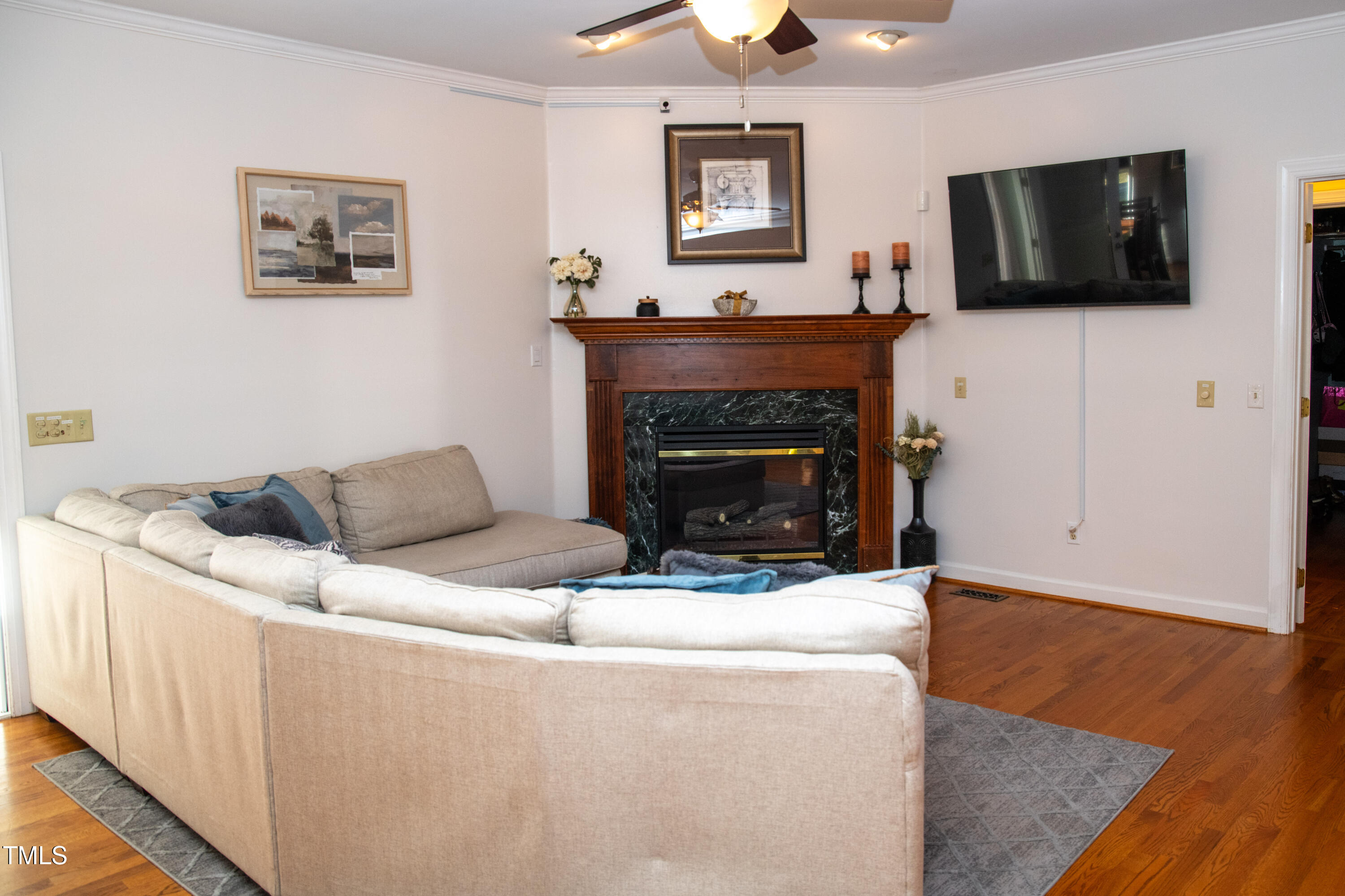 253 Cothran Hicks Road Rougemont, NC 27572 - Photo 18 of 48 a living room with furniture and a flat screen tv