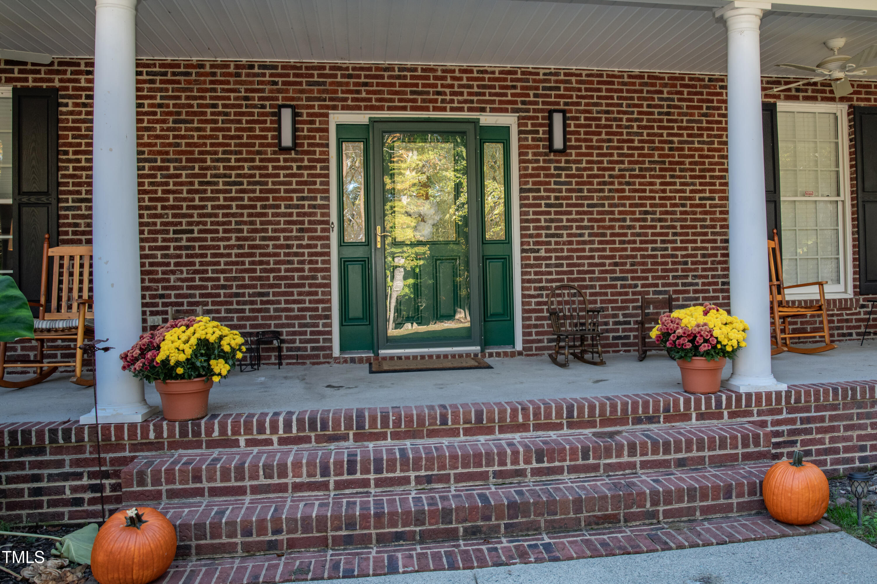 253 Cothran Hicks Road Rougemont, NC 27572 - Photo 2 of 48 a front view of a house with sitting area and furniture