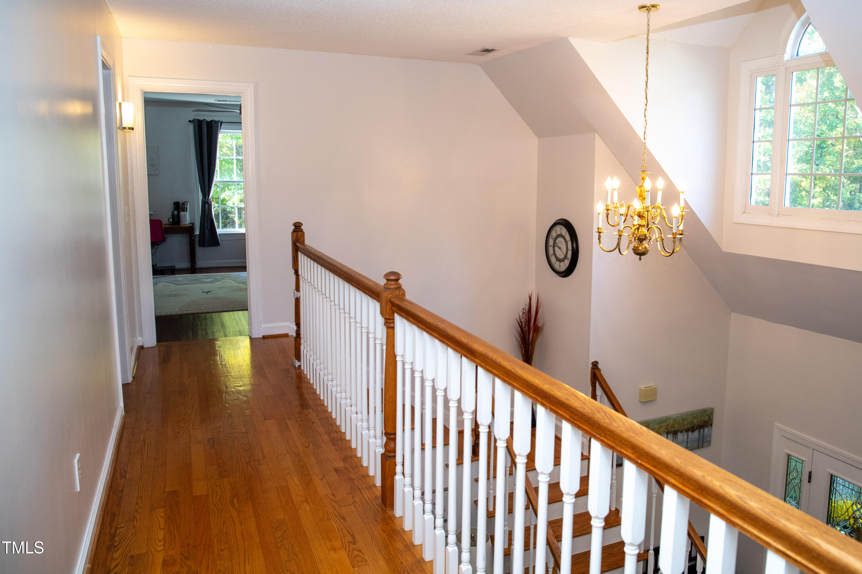 253 Cothran Hicks Road Rougemont, NC 27572 - Photo 34 of 48 a view of a hallway with wooden floor and stairs
