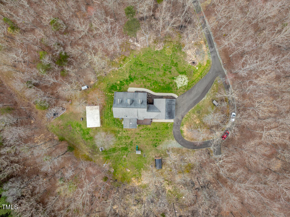 253 Cothran Hicks Road Rougemont, NC 27572 - Photo 5 of 48 a view of a house with a yard