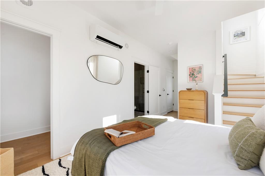 1160 Boulevard Southeast, Unit 11 Atlanta, GA 30312 - Photo 14 of 32 a bedroom with a bed and teddy bear on the dresser
