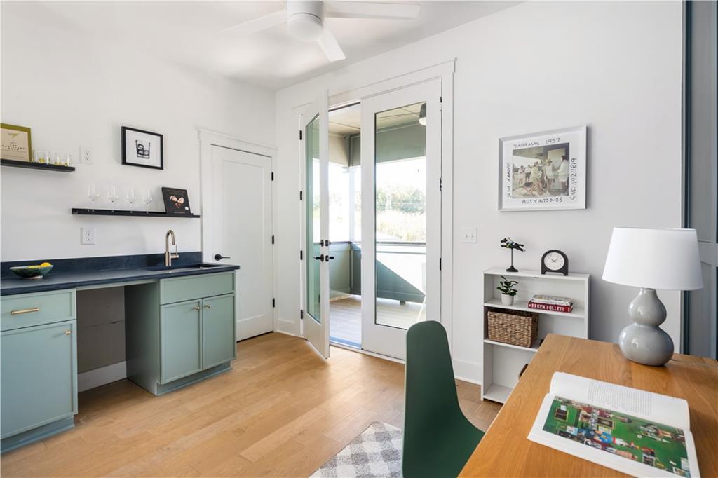 1160 Boulevard Southeast, Unit 11 Atlanta, GA 30312 - Photo 21 of 32 a living room with furniture and a wooden floor
