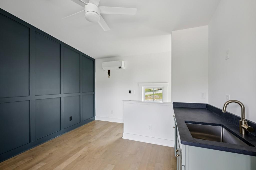 1160 Boulevard Southeast, Unit 11 Atlanta, GA 30312 - Photo 22 of 32 a kitchen with a refrigerator and a sink
