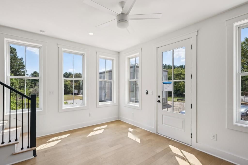1160 Boulevard Southeast, Unit 11 Atlanta, GA 30312 - Photo 9 of 32 an empty room with windows and entrance