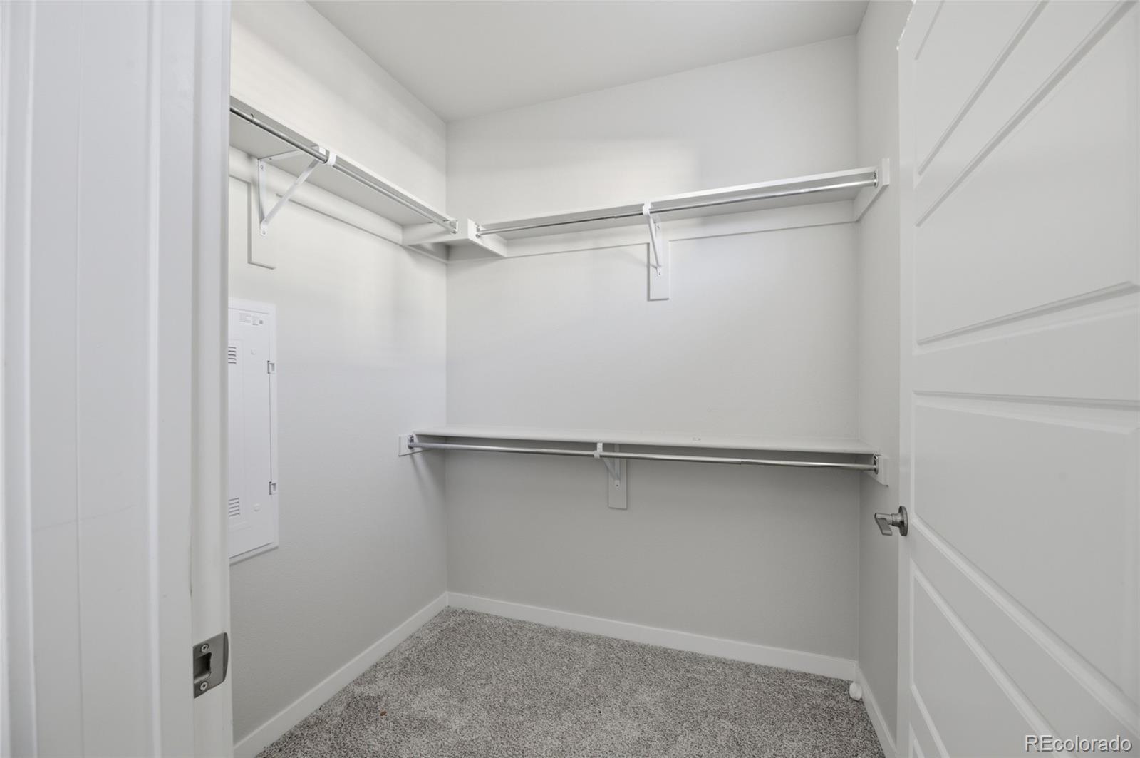 9291 Twenty Mile Road, Unit 207 Parker, CO 80134 - Photo 15 of 25 a view of an empty walk in closet
