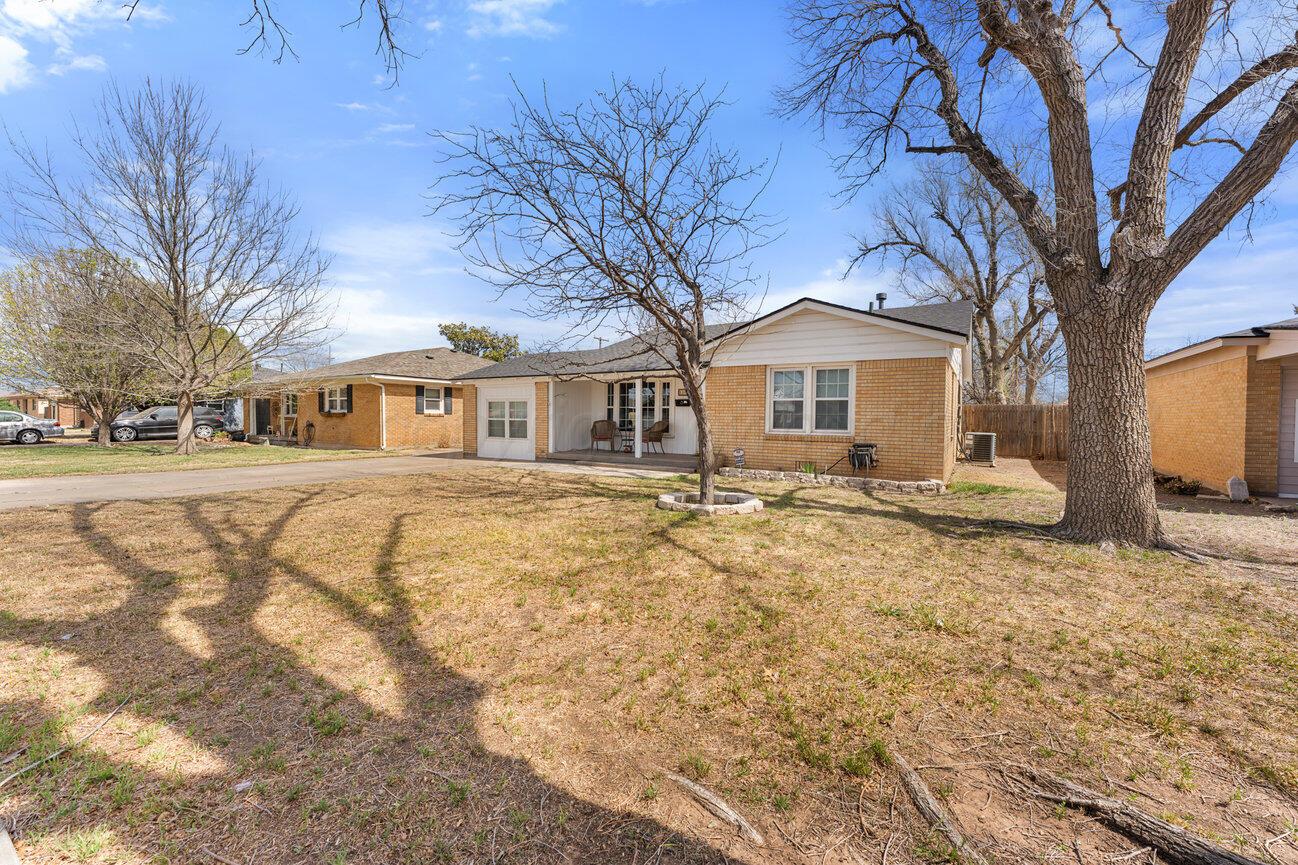1109 Callahan Street Amarillo, TX 79106 - Photo 1 of 23 a front view of a house with a yard