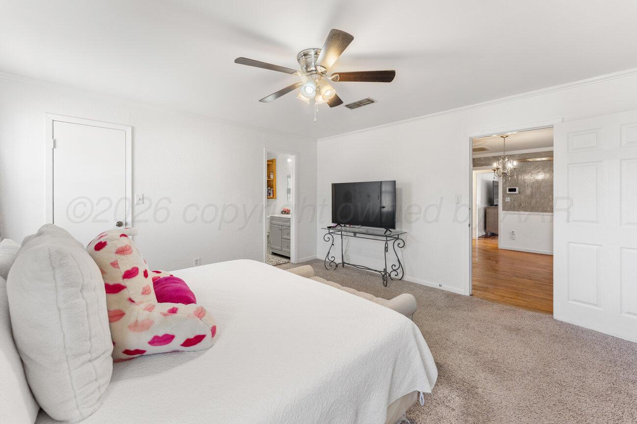 1109 Callahan Street Amarillo, TX 79106 - Photo 23 of 23 a bedroom with a bed and a flat screen tv