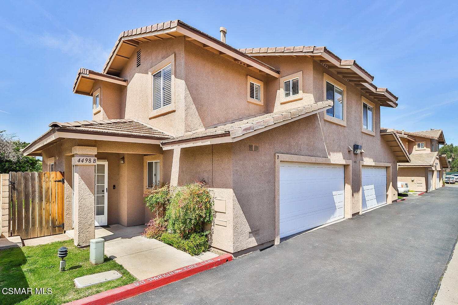 4498 Apricot Road, Unit B Simi Valley, CA 93063 - Photo 1 of 36 a front view of a house with garden