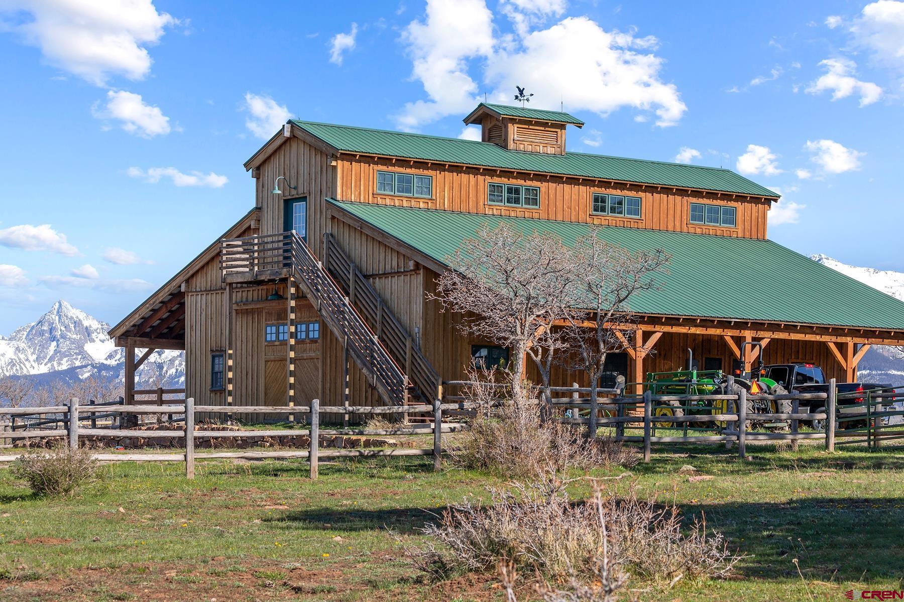 4234 Brown Ranch Road Placerville, CO 81430 - Photo 12 of 16 a view of a house with swimming pool
