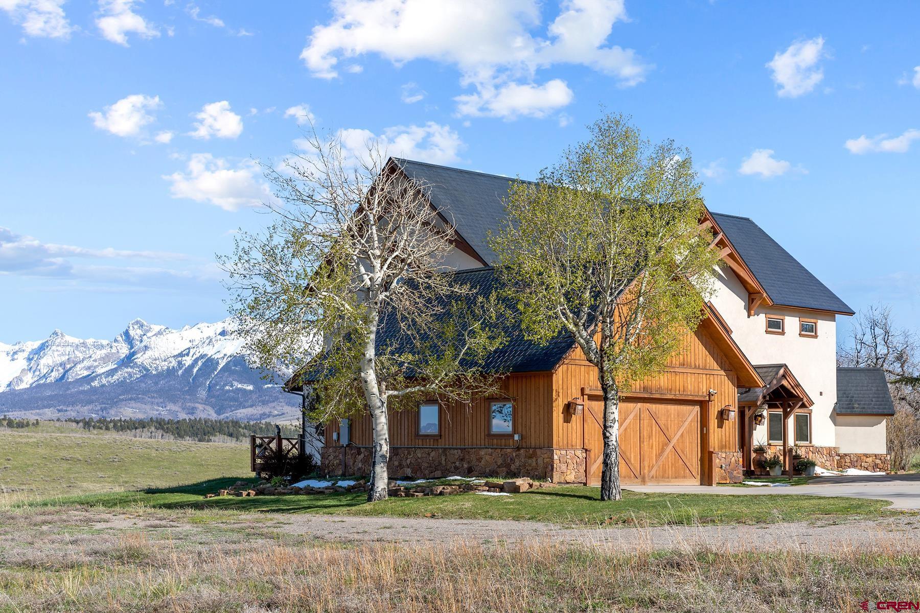 4234 Brown Ranch Road Placerville, CO 81430 - Photo 4 of 16 a view of house with a yard
