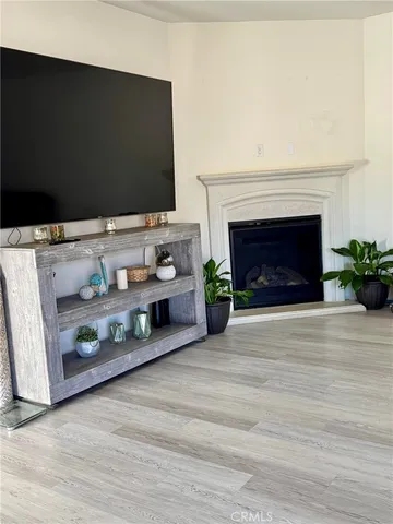 a kitchen with stainless steel appliances granite countertop a refrigerator a stove top oven a sink and dishwasher