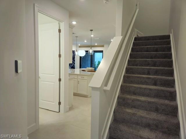 Undisclosed Address Naples, FL 34119 - Photo 20 of 50 a view of entryway and hall