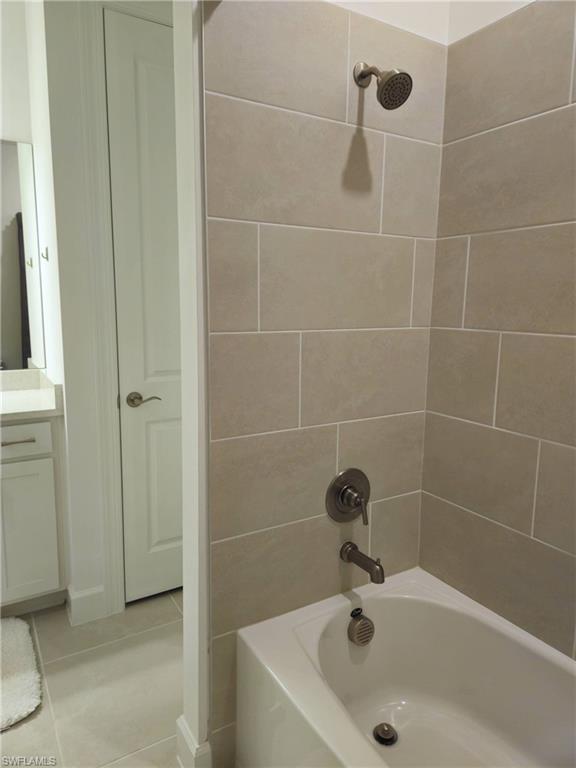 Undisclosed Address Naples, FL 34119 - Photo 34 of 50 a bath tub sitting next to a white sink