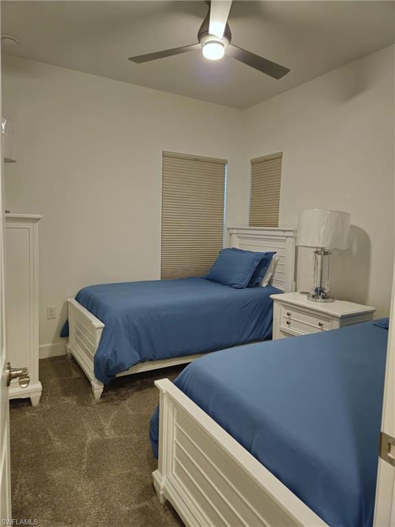 Undisclosed Address Naples, FL 34119 - Photo 35 of 50 a bedroom with bed and window