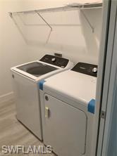 Undisclosed Address Naples, FL 34119 - Photo 39 of 50 a utility room with dryer and washer