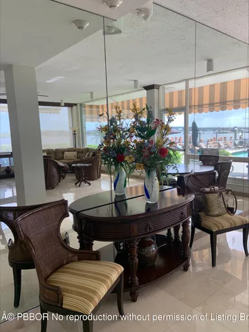 a view of a balcony with wooden floor