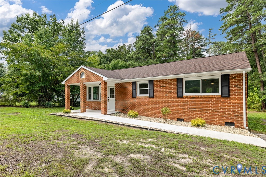 27523 Flank Road Petersburg, VA 23805 - Photo 26 of 34 Brick exterior with a covered front porch and a wh