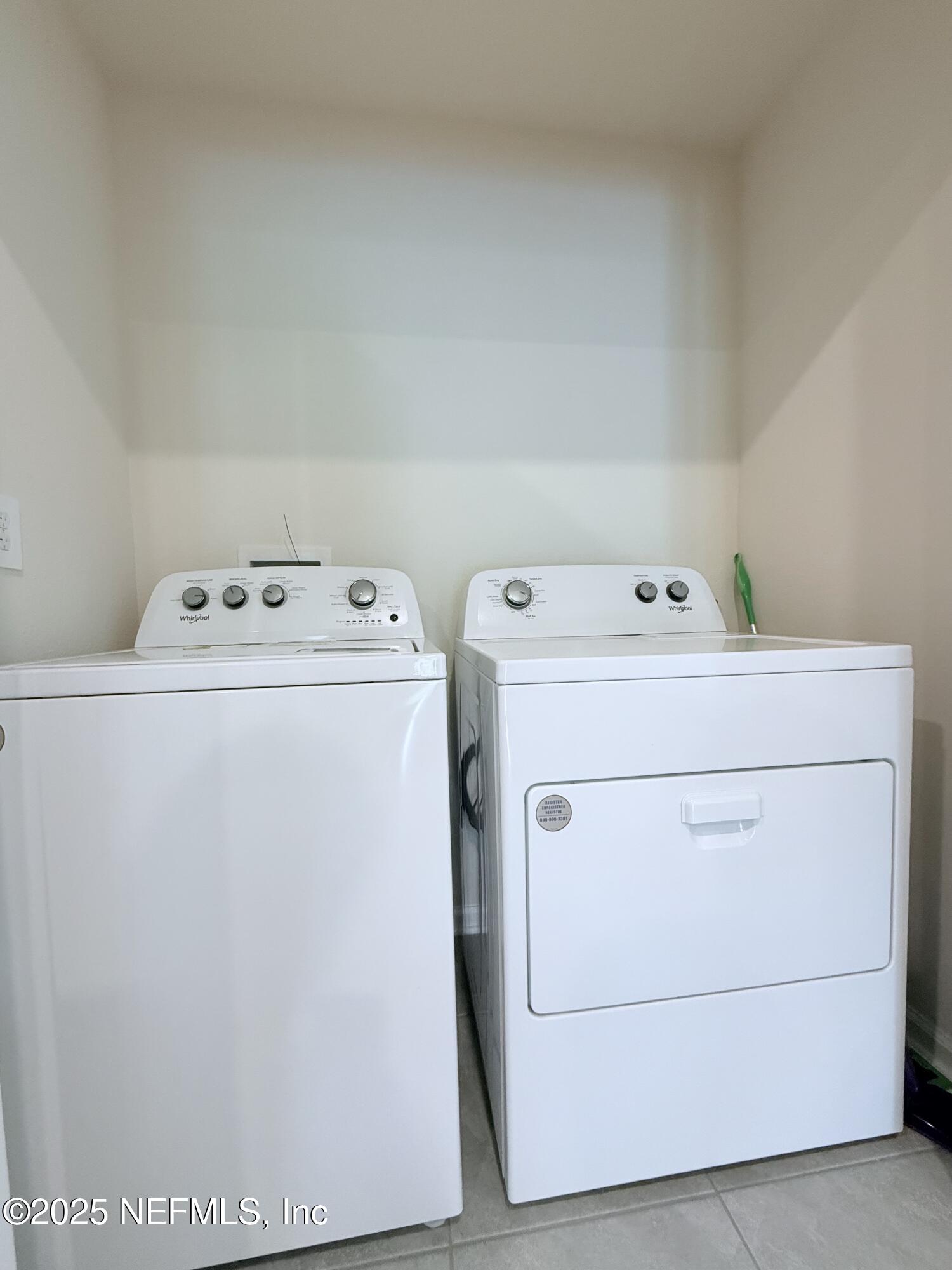 48 Java Lane St. Augustine, FL 32092 - Photo 18 of 26 a utility room with dryer and washer