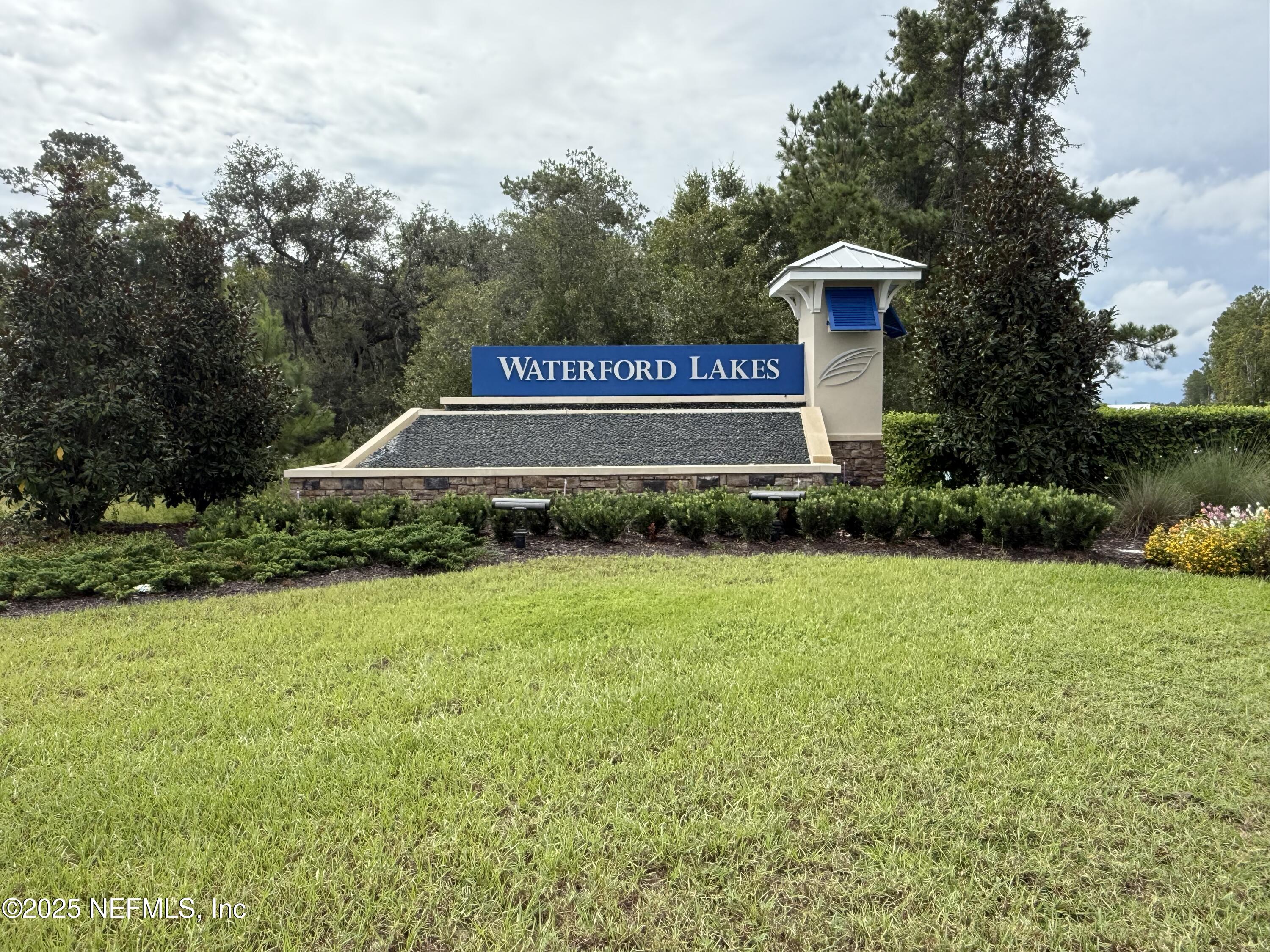 48 Java Lane St. Augustine, FL 32092 - Photo 20 of 26 a view of a sign in front of a house with a yard