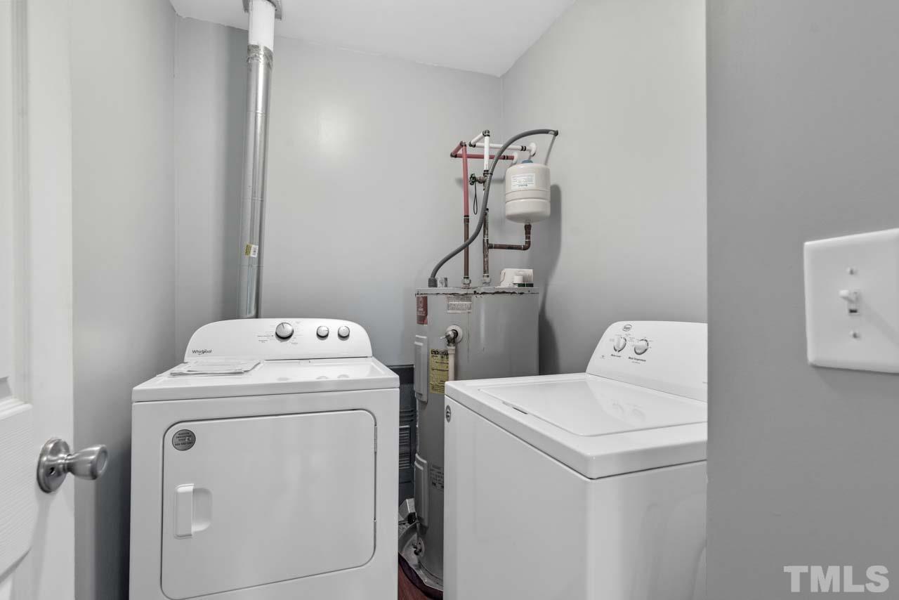 11720 Coppergate Drive, Unit 107 Raleigh, NC 27614 - Photo 12 of 26 a utility room with dryer and washer